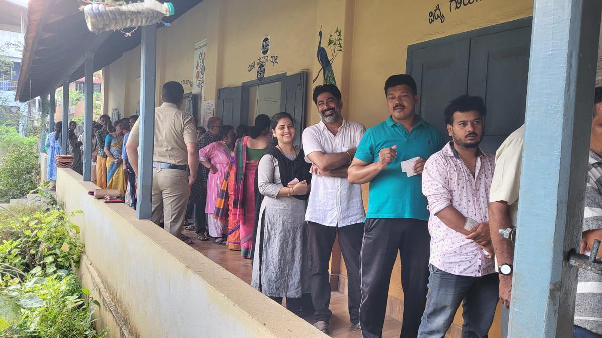 People line up enthusiastically in front of polling stations to cast their vote in Dakshina Kannada Lok Sabha constituency
